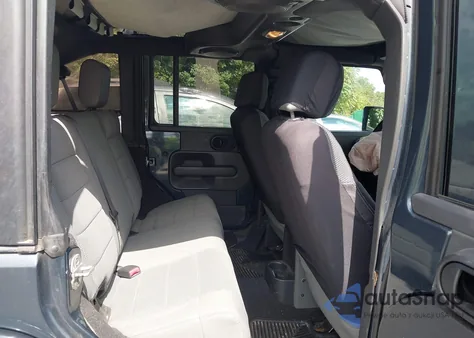 2007 Jeep Wrangler Unlimited Sahara z USA, uszkodzony, nr VIN 1J4GB59117L111449